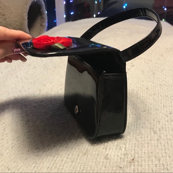 Black patent leather mini purse with rose accents. - Picture 2 of 2